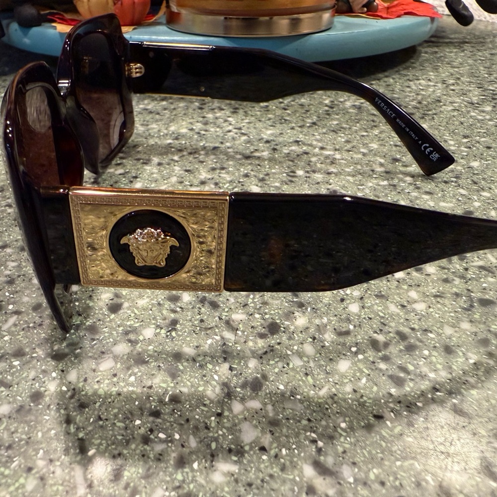 Versace Sunglasses with Black Frame and Gold Detailing